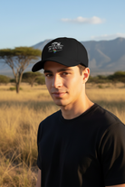 Model wearing Black 28° South Cap